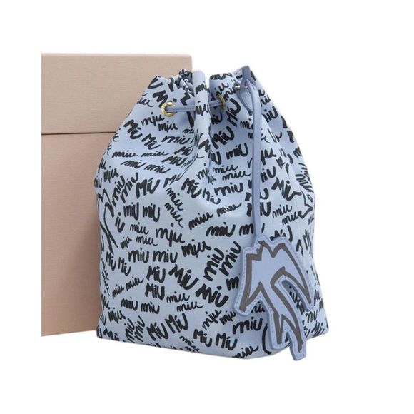 Pre Loved Miu Miu Cotton Handbag with Gold Accents - Picture 2 of 8